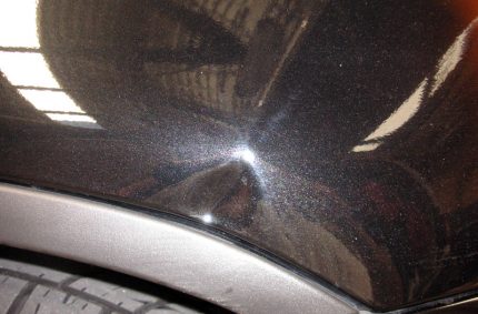 Dent Above Wheel