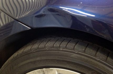 Dent Above Wheel