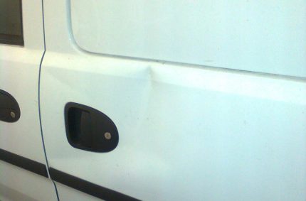 Dent On Door